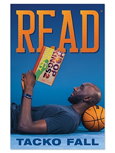 image of basketball player Tacko Fall reading a book